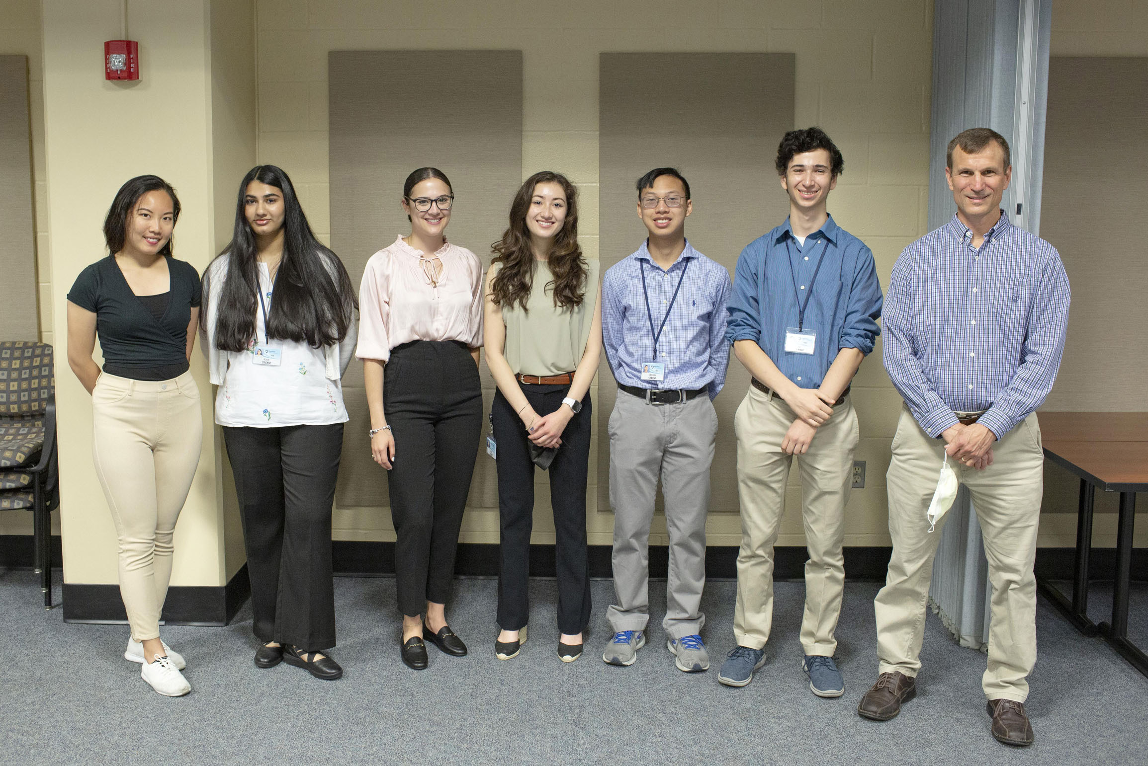 Student participants in the American Heart Association Undergraduate Summer Fellowship are seen in 2022 with Program Director Dr. Christopher Yengo.