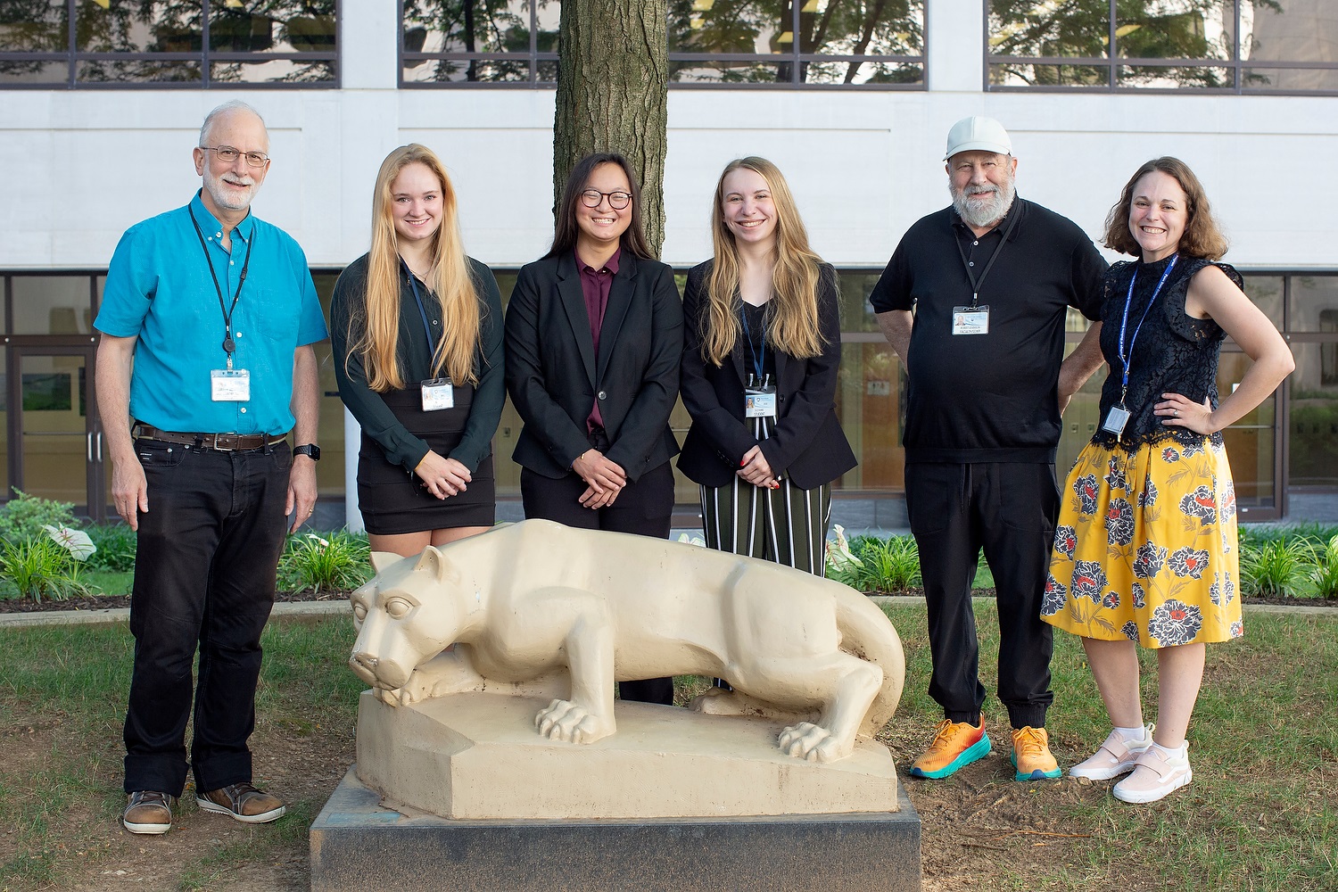 Schreyer Honors College MD/PhD Summer Exposure Program participants pose behind a Nittany Lion statue, along with associate director Aron Lukacher, MD, PhD; co-director Robert Levenson, PhD, right; and program administrator Alison Smolinski, MA.