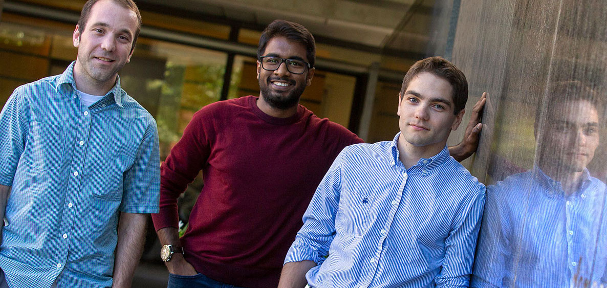 Three students in Penn State College of Medicine's Biostatistics PhD program are seen in 2019. The three young men are seen leaning against a wall outside the College of Medicine. They are, from left, Daniel McGuire, Vishal Midya and Renan Sauteraud.