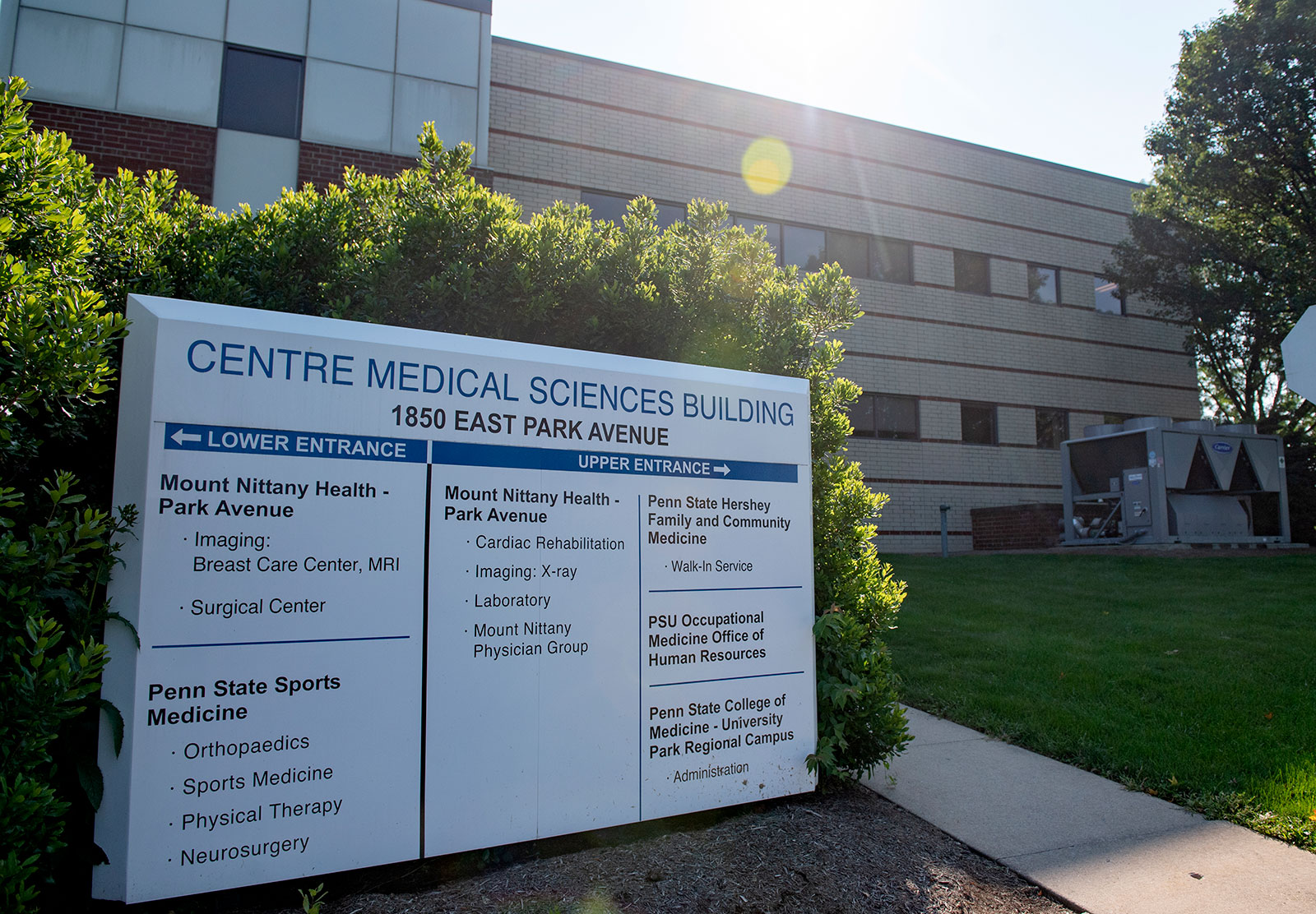 The Centre Medical Science Building in State College is one place where Penn State College of Medicine's University Park Curriculum MD students study. The image shows the front of the building in the sunlight, and the building's sign is visible.