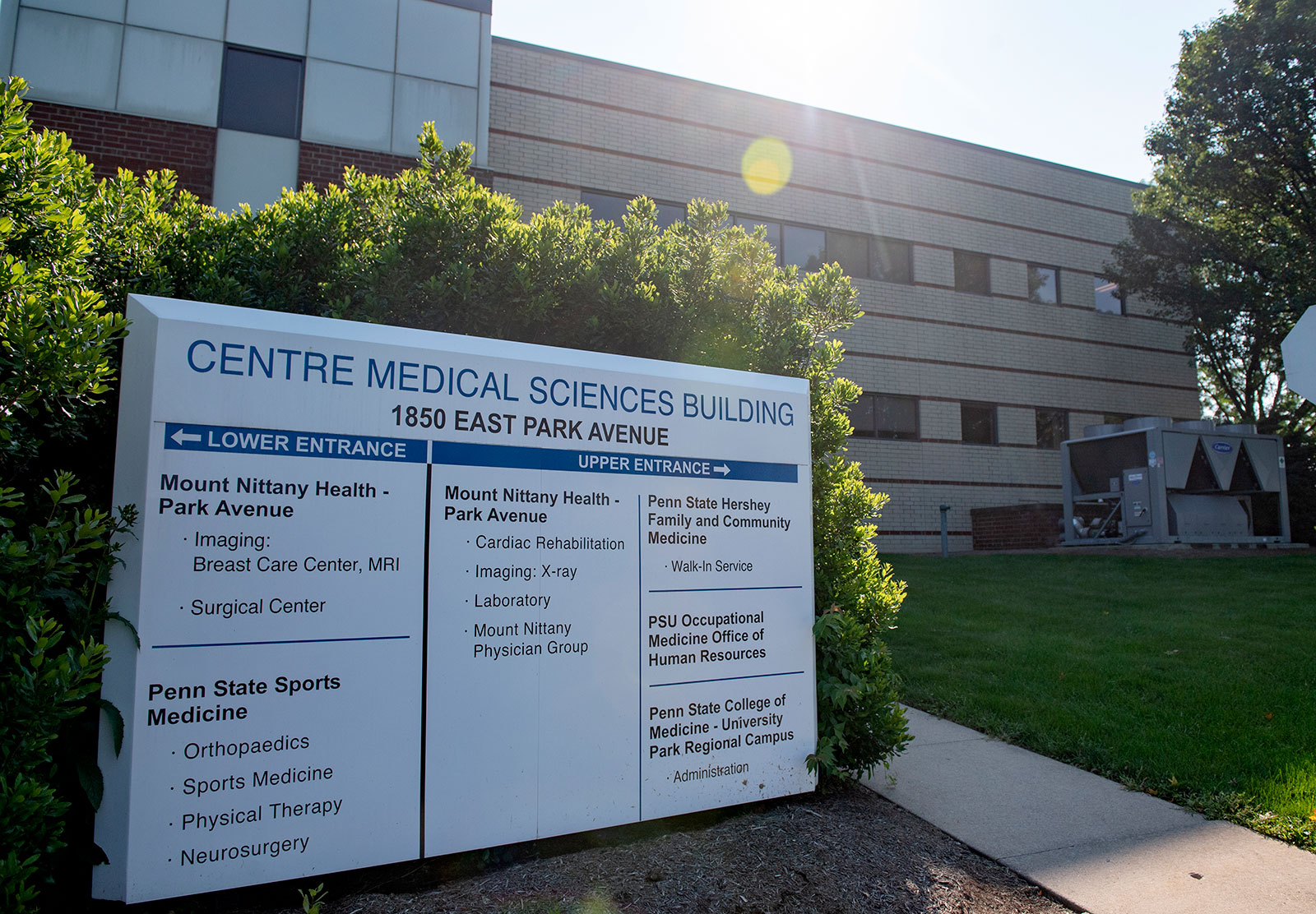 The Centre Medical Science Building in State College is one place where Penn State College of Medicine's University Park campus MD students study. The image shows the front of the building in the sunlight, and the building's sign is visible.